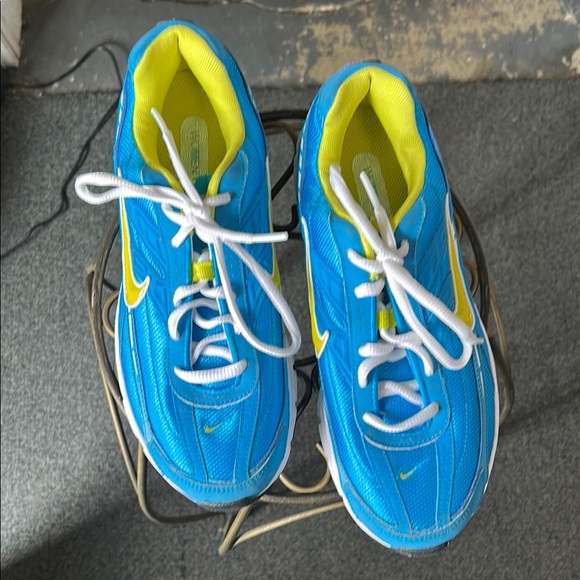 Nike Blue and Yellow Athletic Running Shoes with Sporty Design - Picture 1 of 14